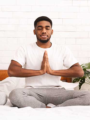 Young man meditating